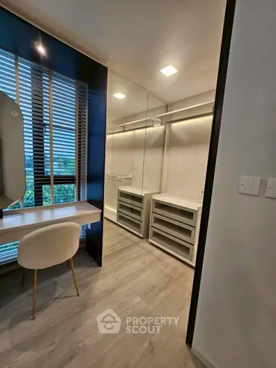 Spacious walk-in closet with modern design and ample storage space