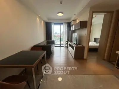Modern living room with balcony view in stylish apartment