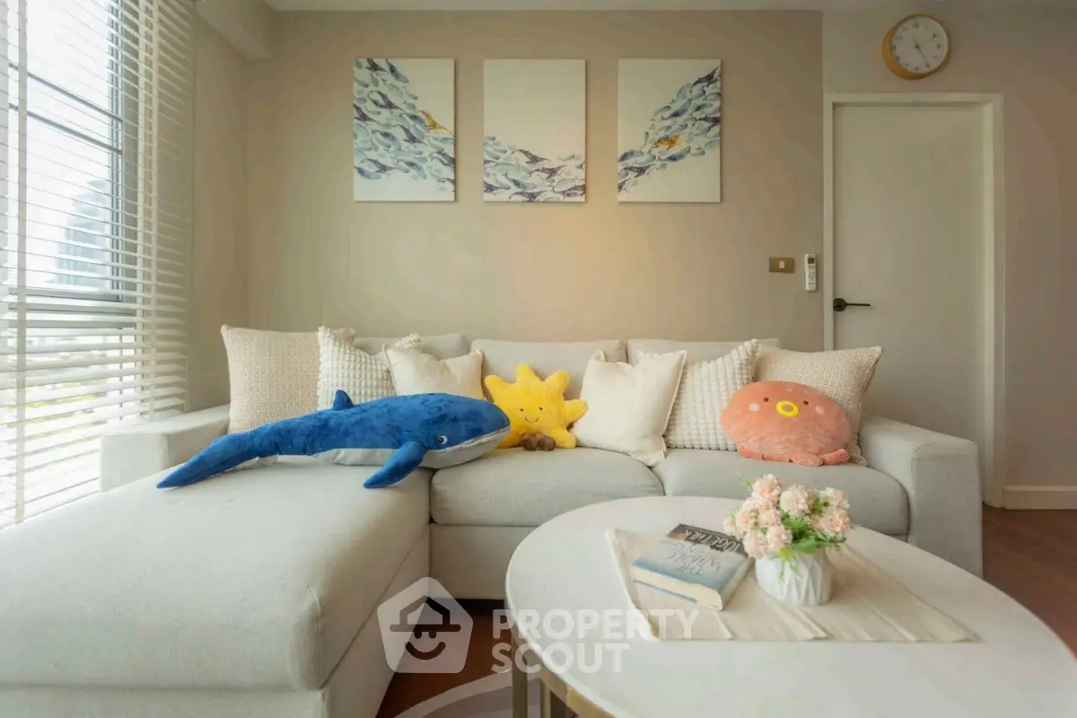 Cozy living room with plush sofa and charming decor