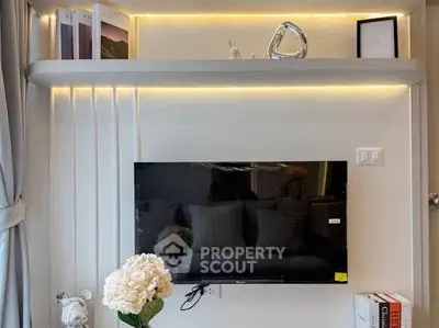 Modern living room with sleek TV setup and elegant decor