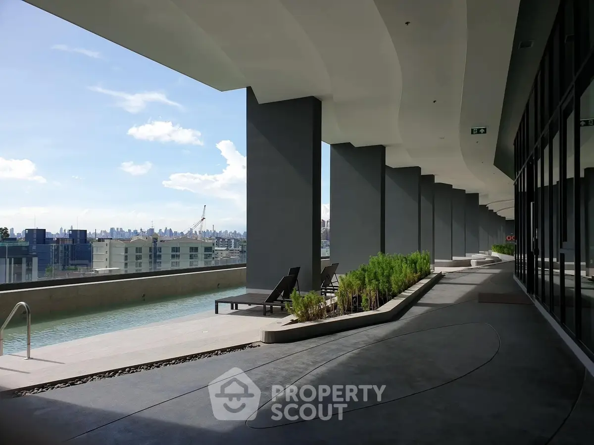 Luxurious rooftop pool area with stunning city views and modern design.