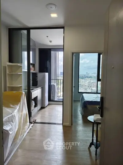 Modern apartment interior with balcony view and sleek design