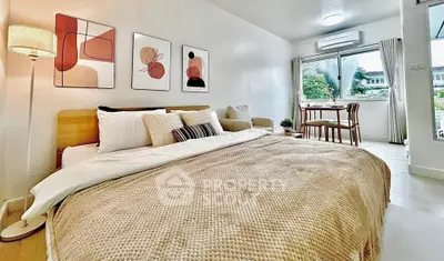 Modern bedroom with cozy decor and natural light