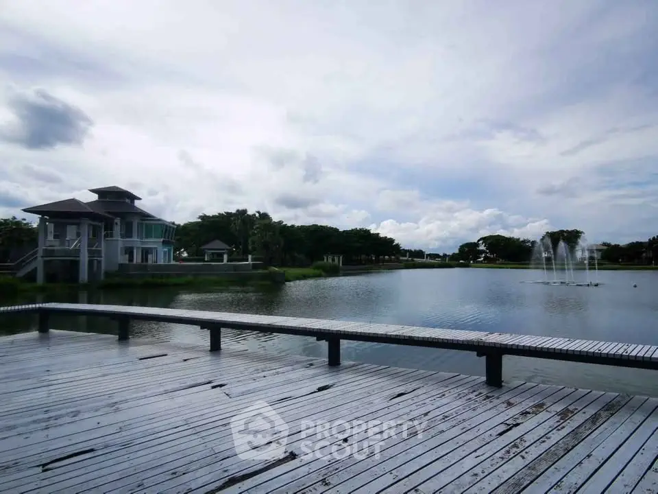Stunning lakeside property with serene views and modern architecture, perfect for tranquil living.