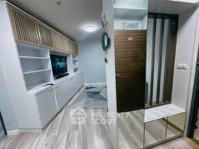 Modern living room with sleek storage and stylish decor