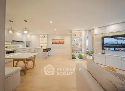 Spacious modern living room with open kitchen and elegant decor
