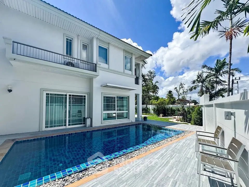 Luxurious modern villa with private pool and lush garden, perfect for serene living.