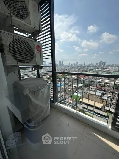 High-rise balcony with cityscape view and air conditioning units, perfect for urban living.