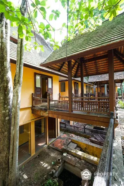 Charming wooden house with rustic design and lush greenery, perfect for nature lovers seeking tranquility.