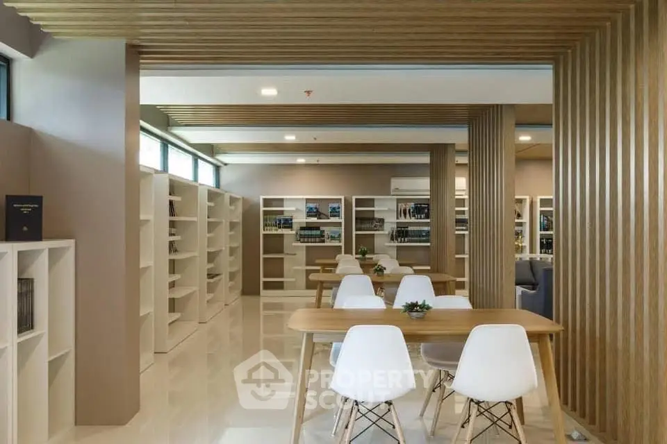 Modern library with sleek wooden accents and stylish seating