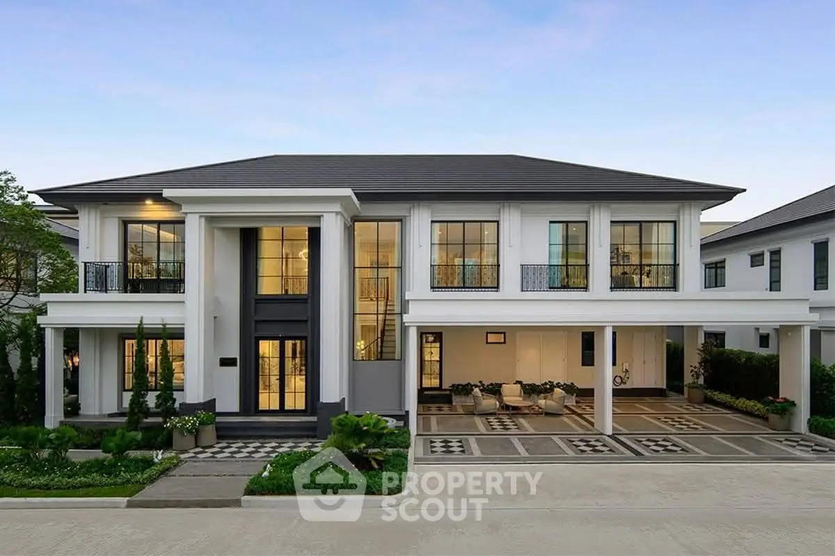 Luxurious modern two-story house with elegant facade and spacious driveway