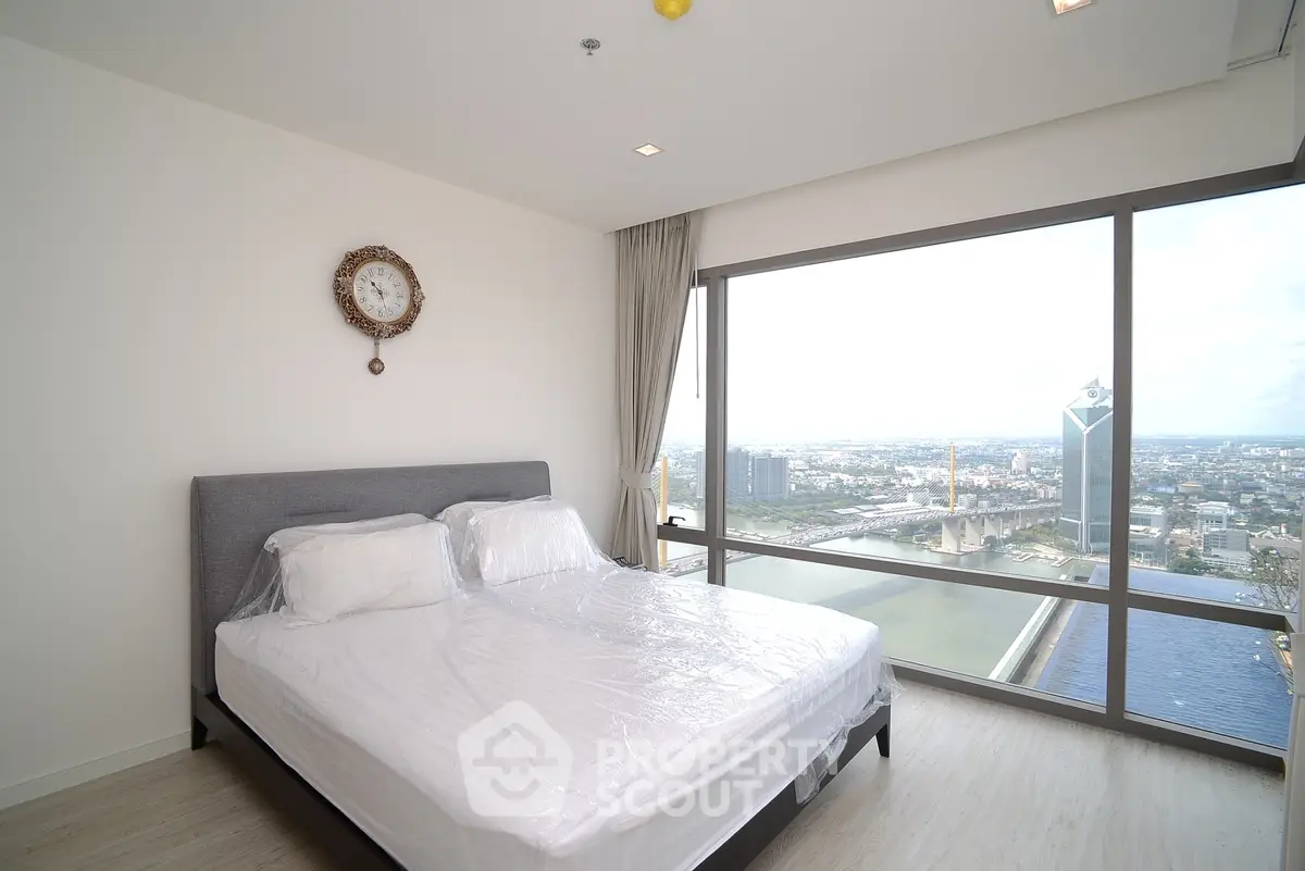 Luxurious bedroom with stunning city view and modern decor