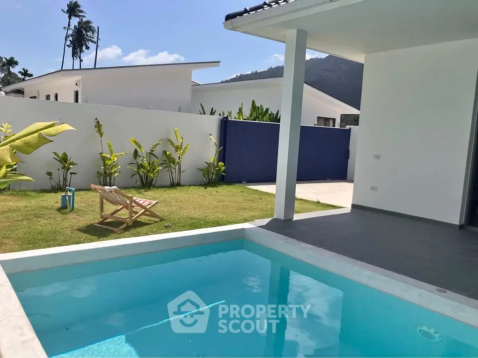 Modern villa with private pool and lush garden, perfect for relaxation and luxury living.