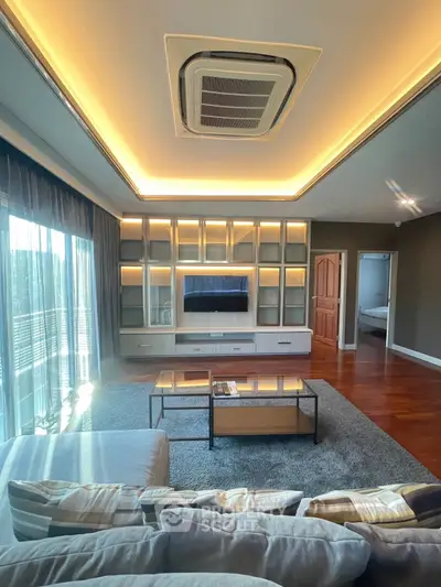Luxurious living room with modern lighting and stylish furniture