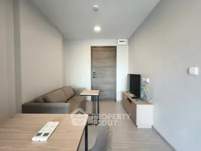 Modern living room with minimalist furniture and neutral tones