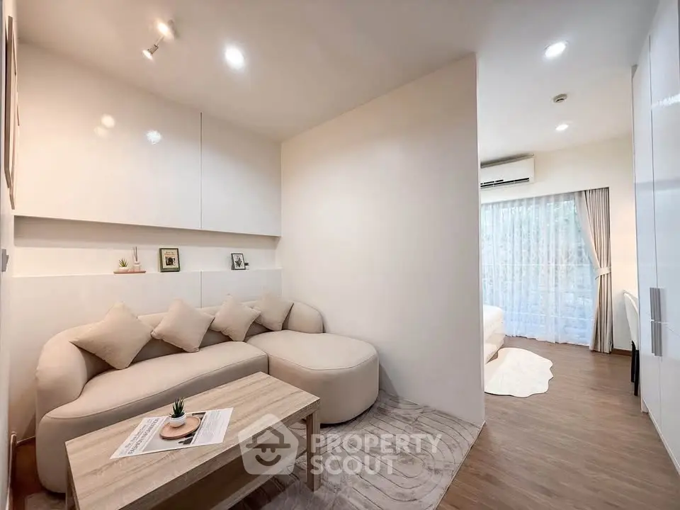 Modern living room with cozy sofa and elegant decor in a stylish apartment