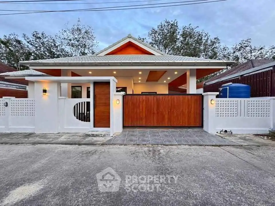 Charming modern bungalow with stylish wooden gate and spacious driveway