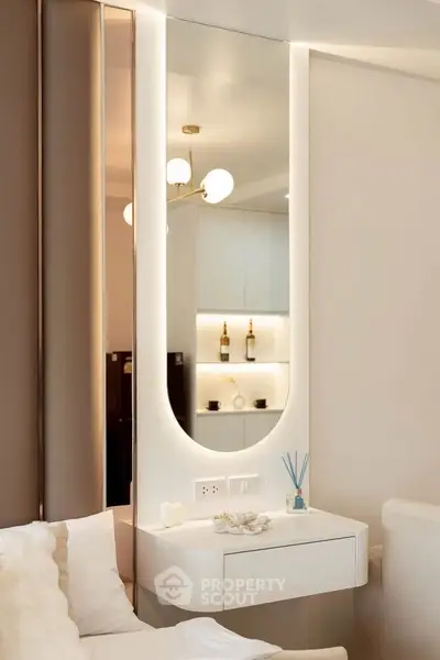 Elegant modern bedroom with stylish mirror and soft lighting