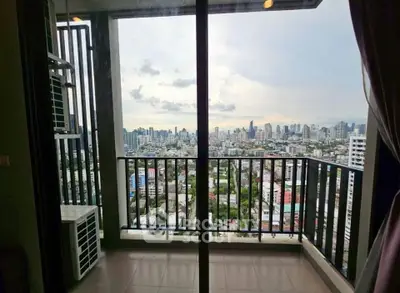 Stunning cityscape view from a high-rise balcony, perfect for urban living enthusiasts.