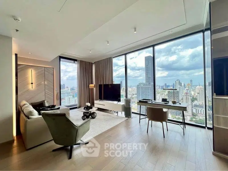 Luxurious living room with panoramic city views and modern furnishings in high-rise apartment.