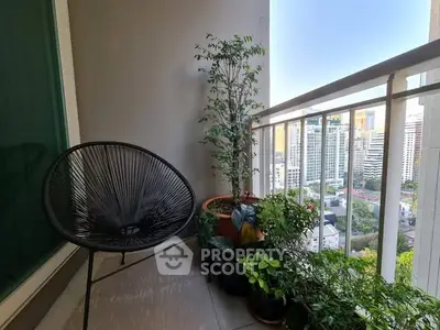 Charming balcony with city view and lush potted plants