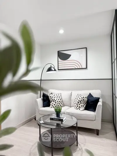 Stylish modern living room with cozy sofa and chic decor