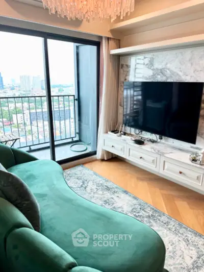 Luxurious living room with chic green sofa and stunning city view from balcony