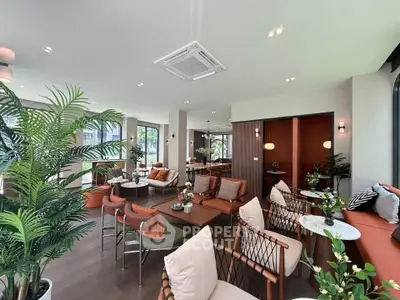 Luxurious modern living room with elegant decor and large windows