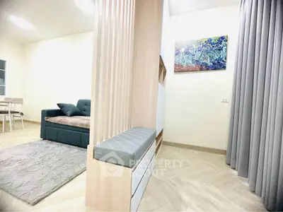 Modern living room with stylish partition and cozy seating area