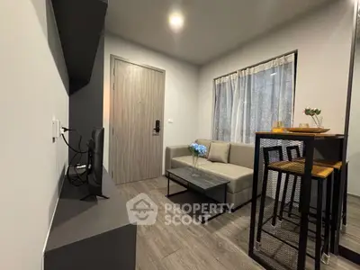 Modern living room with sleek furniture and natural light