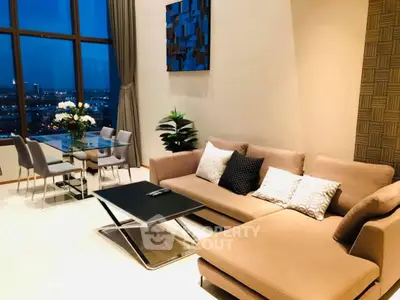 Luxurious living room with modern decor and stunning city view, perfect for urban living.
