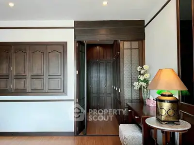 Elegant interior with wooden accents and stylish decor in a cozy living space.