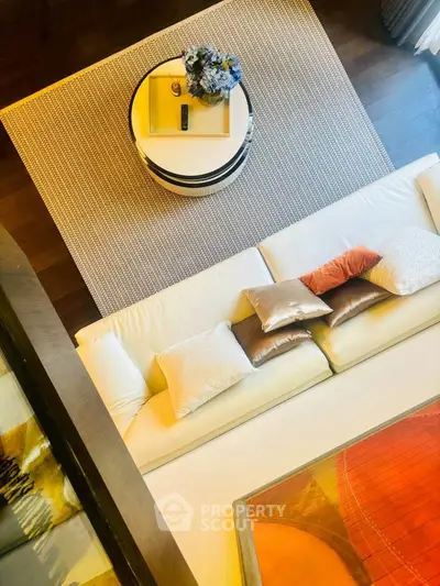 Luxurious living room with modern decor and plush seating, perfect for relaxation and entertaining.