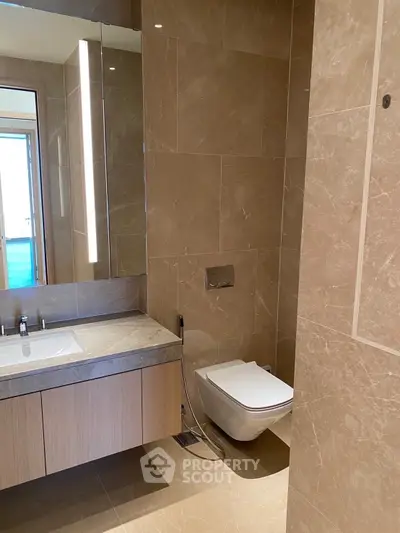 Luxurious modern bathroom with sleek fixtures and elegant marble tiles