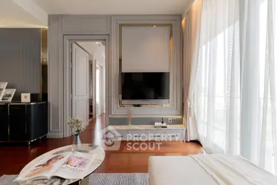 Luxurious living room with modern decor and large windows