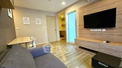 Modern living room with sleek wooden accents and wall-mounted TV