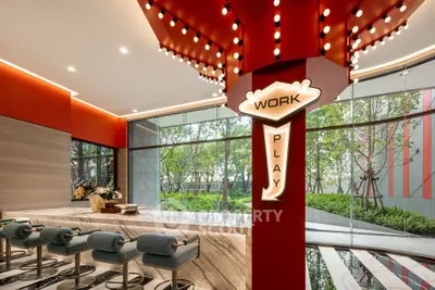 Modern interior with stylish bar and garden view, perfect for work and play.