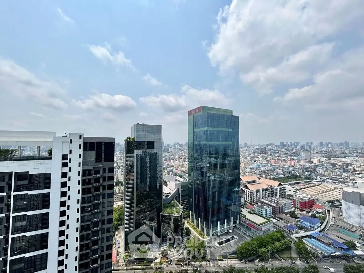 Stunning cityscape view from high-rise building showcasing urban skyline and modern architecture.