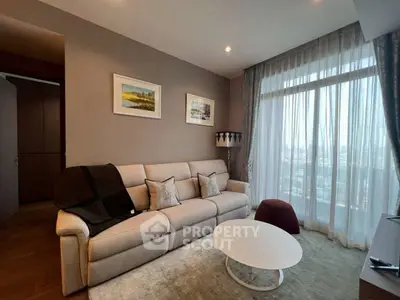 Modern living room with large window and stylish decor