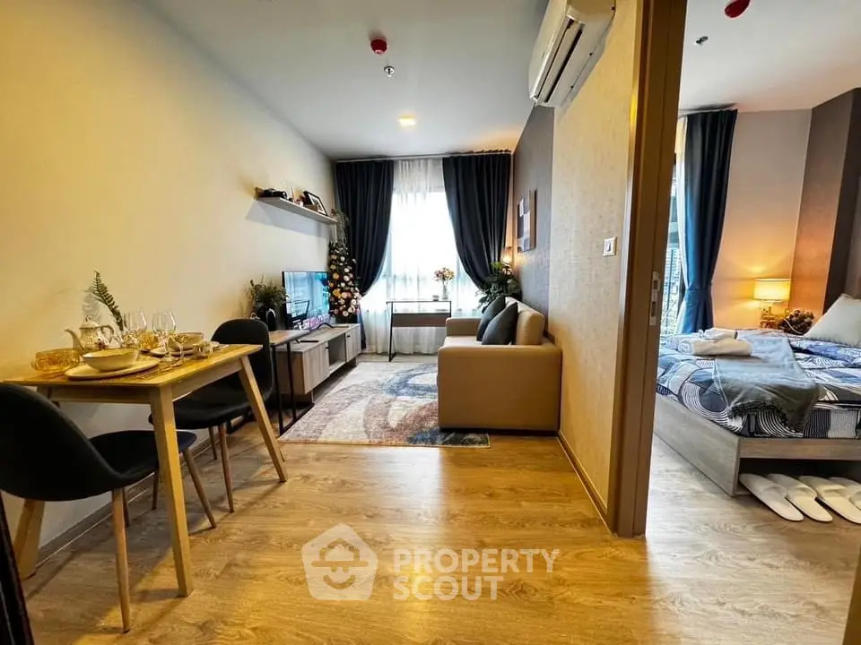 Modern apartment interior with cozy living room and bedroom, featuring stylish decor and natural light.