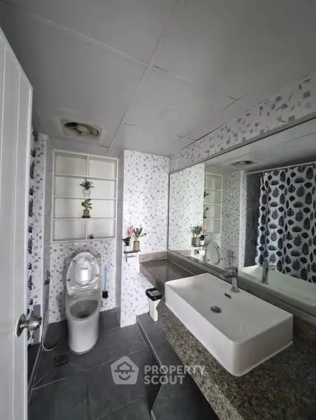 Modern bathroom with elegant fixtures and stylish decor