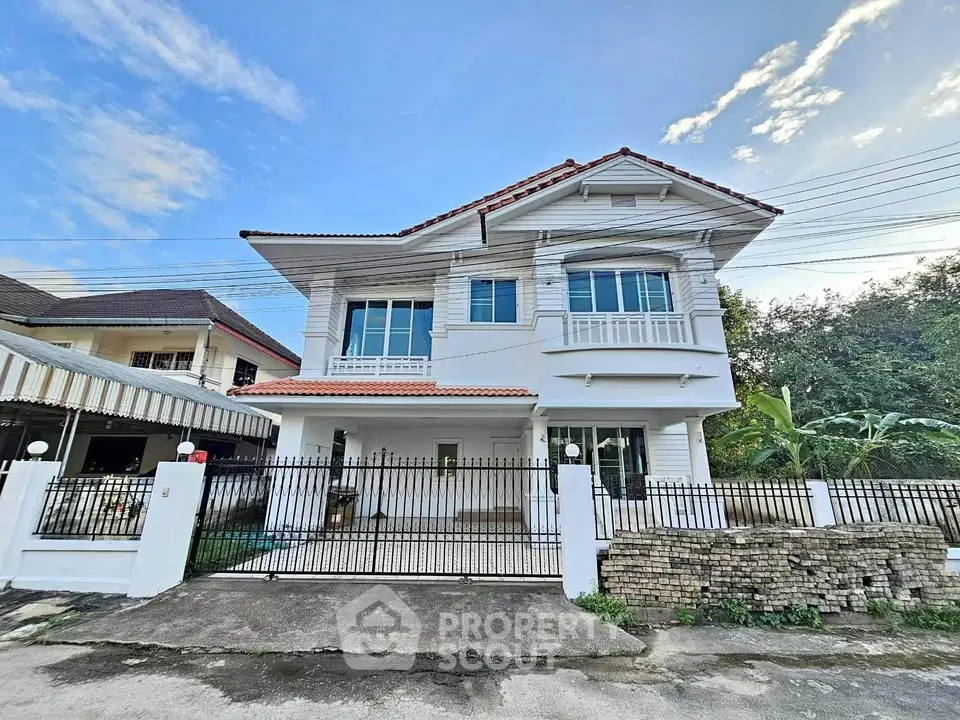 Charming two-story house with spacious front yard and modern architecture