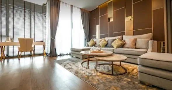 Luxurious modern living room with elegant decor and large windows