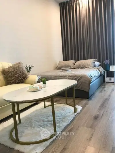 Cozy bedroom with stylish decor and comfortable bed in modern apartment