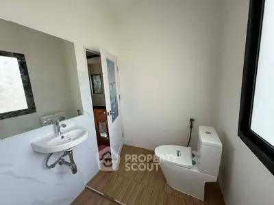 Modern bathroom with sleek fixtures and natural light