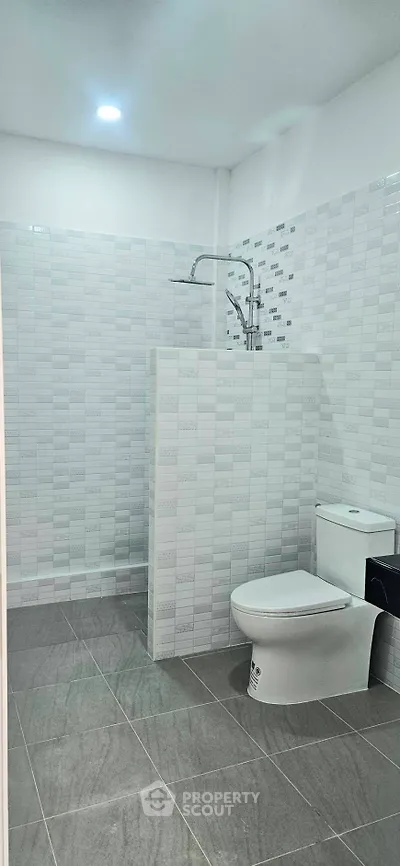 Modern bathroom with sleek tile design and contemporary fixtures
