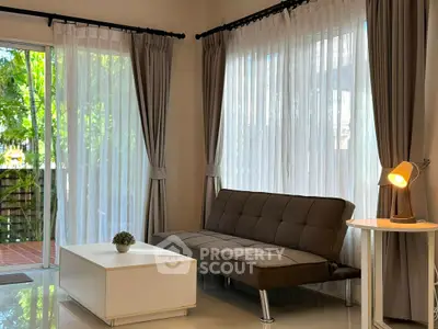 Bright and modern living room with large windows and stylish furniture