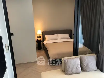 Modern bedroom with cozy bed and stylish decor in a contemporary apartment