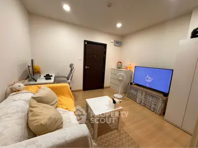 Cozy living room with modern decor and entertainment setup