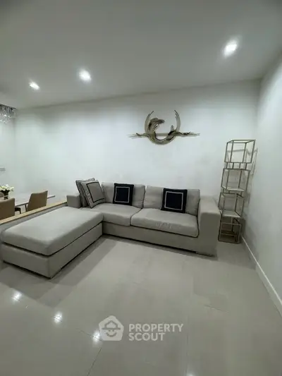 Spacious modern living room with elegant decor and comfortable seating